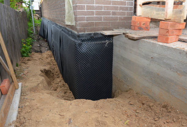 SJ Waterproofing Pros technician performing targeted Exterior Waterproofing assessment in Constantine, MI